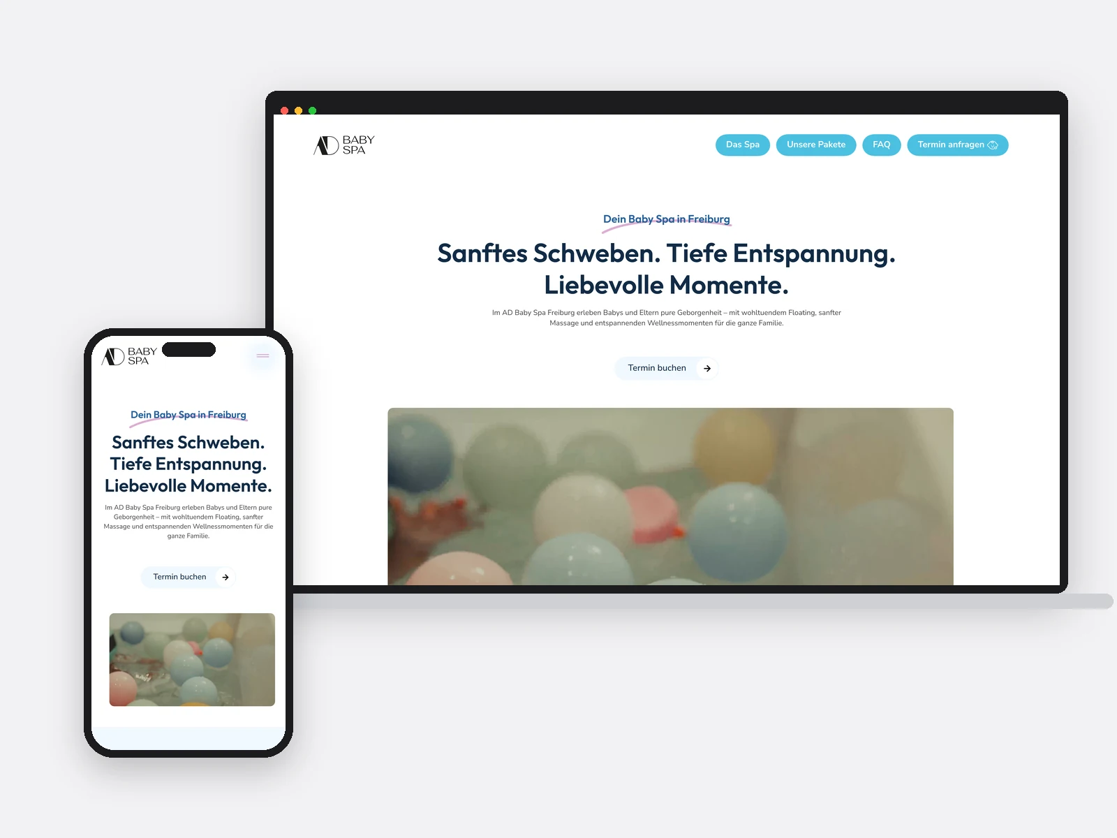 Notebook und Telefon mit der Startseite des Baby-Spa Freiburg