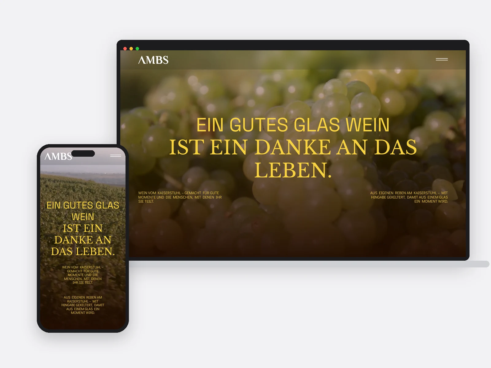 Notebook und Telefon mit der Startseite des Weinguts Ambs